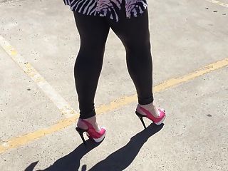 Walking In Wetook Leggings And Pink Heels